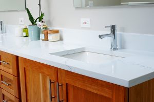Close-up of a white marble bathroom counter